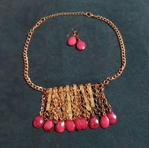 Gold necklace with pink stones